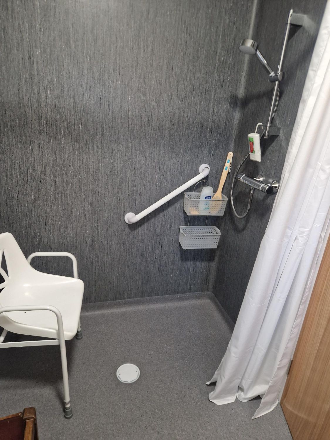 ohal care and repair -image of level access shower